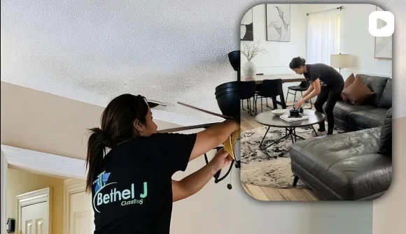 A Bethel J cleaner dusting a ceiling fan